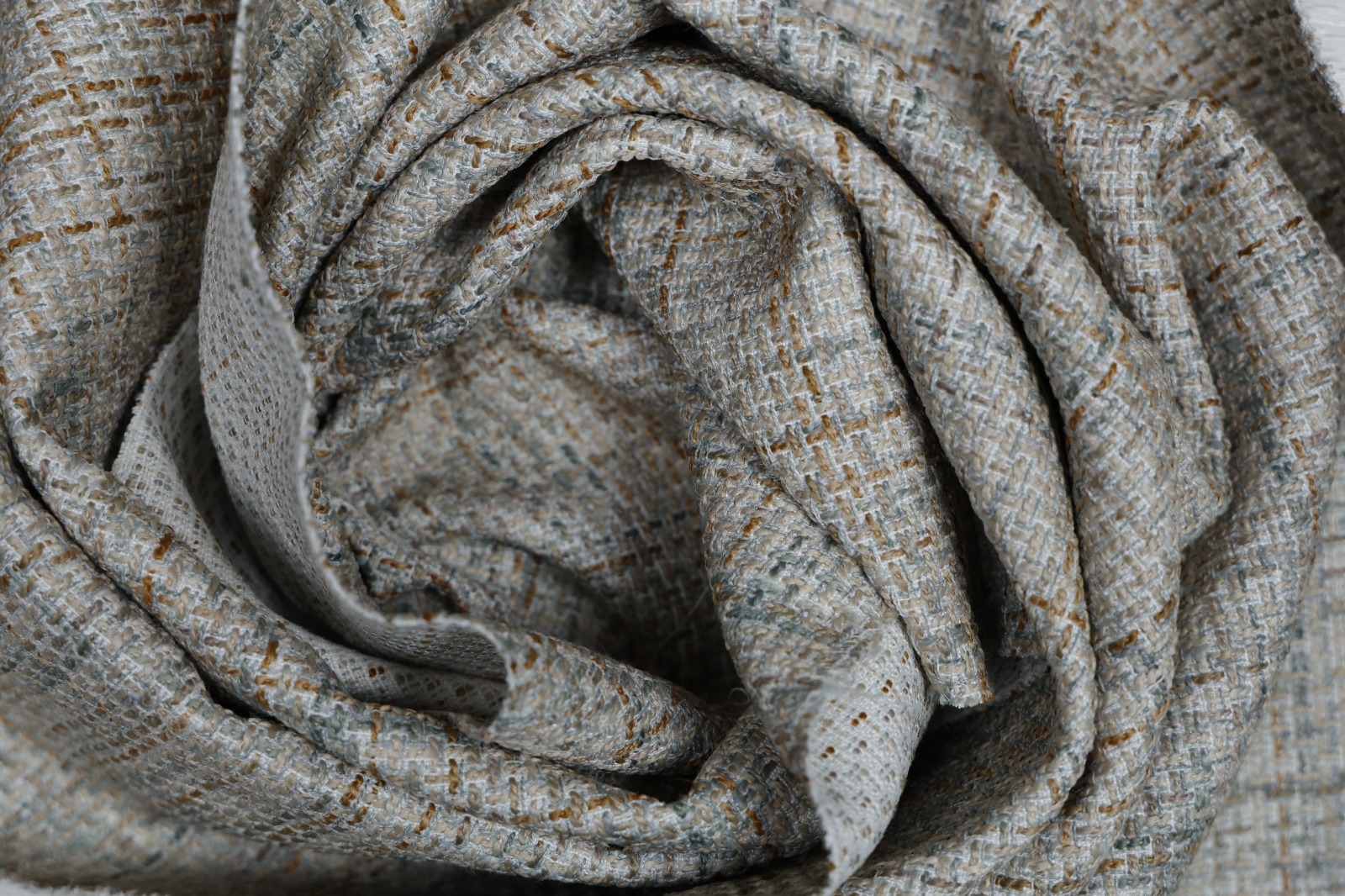 Finished furnishing textile showing surface character and fold